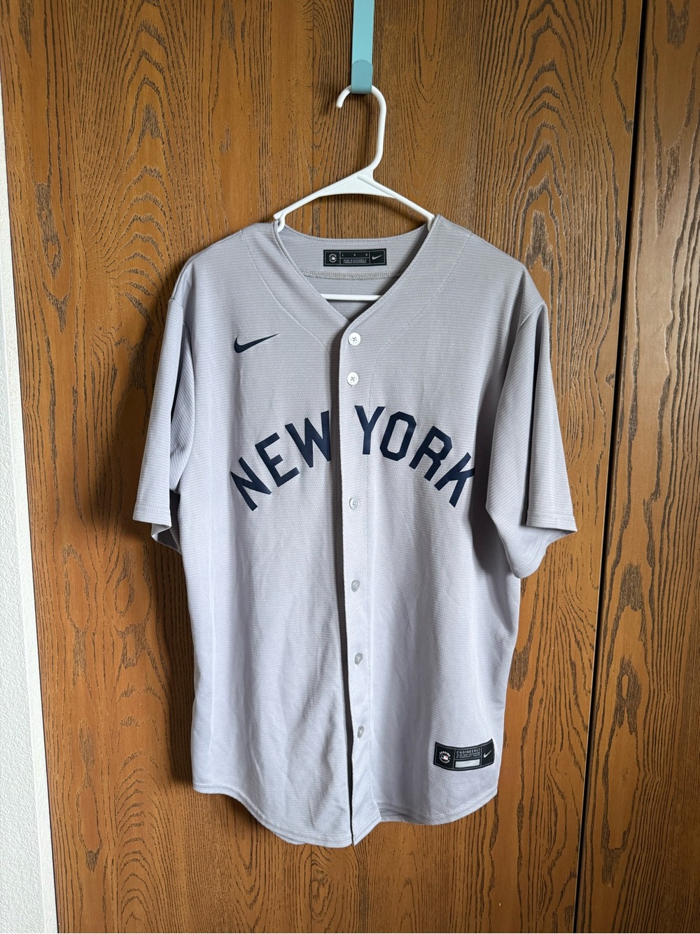 Nike Men's New York Baseball Jersey in Light Gray with Navy Lettering